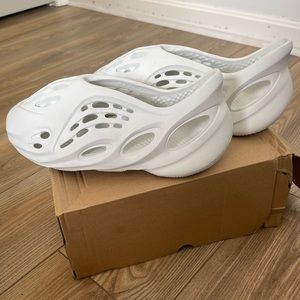 White foam runner shoes